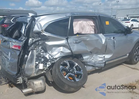 2018 Honda Cr-V Touring z USA, uszkodzony, nr VIN 7FARW1H93JE001455